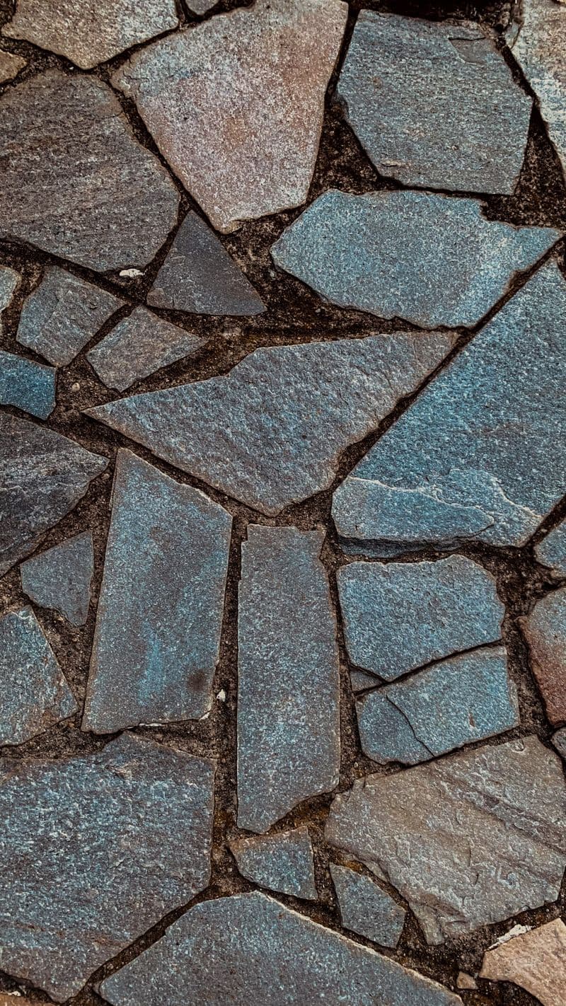 Close-up of irregular blue-gray bluestone flagging